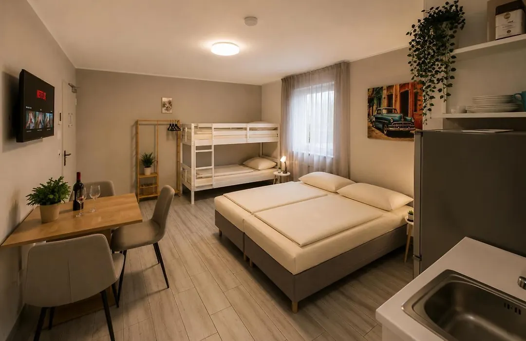 Hotel Prime Living Apartments Küche Netflix-1